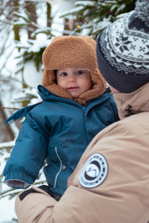 Smiling child in winter attire outdoorsの写真素材