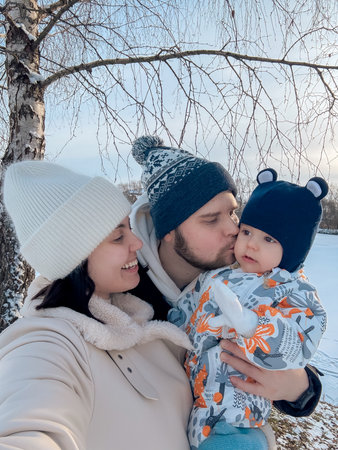 Happy Family Enjoying a Winter Dayの写真素材