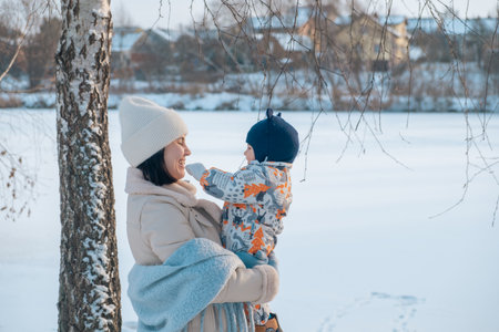 Mother and Baby in Winter Wonderlandの写真素材