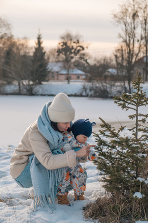 Mother and Baby in Winter Wonderlandの写真素材