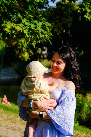 Joyful Mother and Baby by the Lake