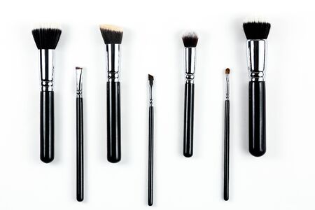 Makeup brushes on white background
