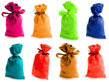 Beautiful multi-coloured sacks made of cloth fastened by a bandの写真素材