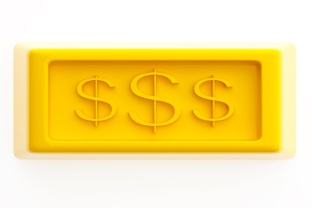 Shiny gold ingots on a white backgroundの写真素材