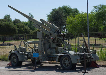 anti-aircraft gun large barrel green wheels