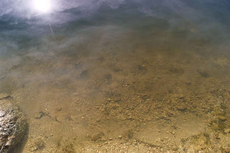 landscape lake view water embalse de la jarosa madrid trees mountains sky cloudsの写真素材