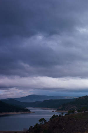 landscape mountains sky clouds nature view treesの写真素材