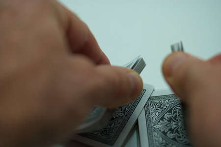 Playing cards, close-up of the hands of a man.