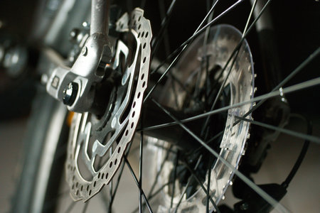 Bicycle rear wheel close-up. Selective focus on the front wheel.