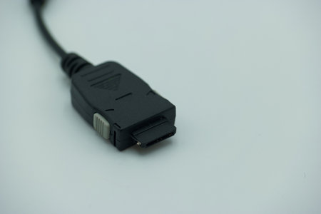 USB cable on a white background. Close-up. selective focus.