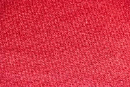 Red fabric texture or background for design with copy space for text or image.