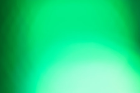 green bokeh abstract light background.abstract green bokeh backgroundの写真素材