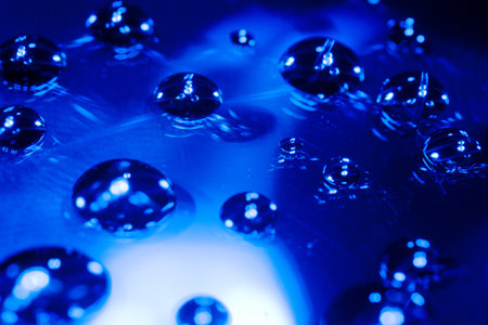 Water drops on a blue background. Close-up. abstract background.の写真素材