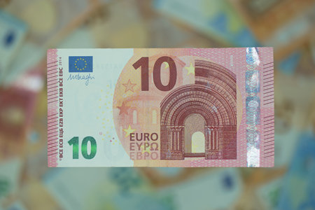 One hundred euro banknote close-up on a blurred background of money