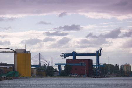 Industrial landscape with cranes and containers in the port of Hamburgの写真素材