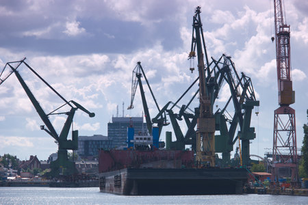 Cargo port with cranes and ships in Gdansk, Poland