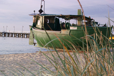 Fishing boat on the beach of the Baltic Sea in Poland.の写真素材