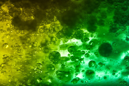 abstract green and yellow background with bubbles in water. abstract backgroundの写真素材