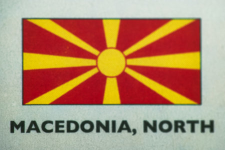 Macedonia national flag on textured paper background, close up