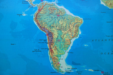 Map of South America on a wooden table. Close-up.の写真素材