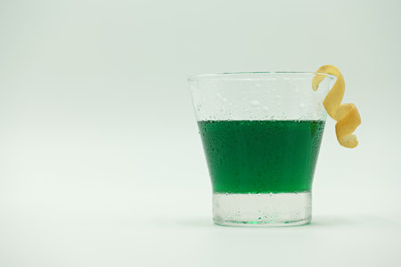Green drink in glass on white background with filter effect retro vintage style