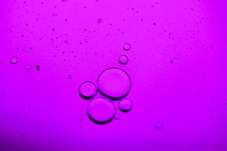 Bubbles in the water on a purple background. Abstract background.の写真素材