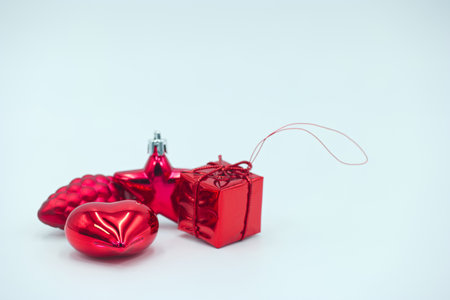 Red gift box and heart shape on white background. Valentines day concept.の写真素材