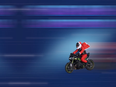 blur santa claus motor motorcycle transportation in motion outdoors background speed wheels handlebar superbikeの写真素材