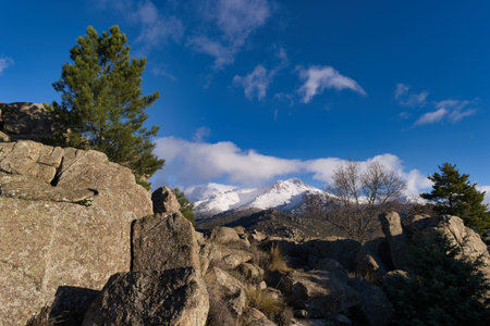 ...View of the Sierra de Guadarrama mountain range near Madrid in Spain with winter sky in the...