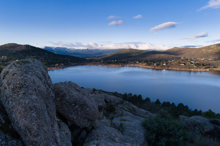 View of the Sierra de Guadarrama mountain range near Madrid in Spain, with a lake in the background, a beautiful landscapeの写真素材