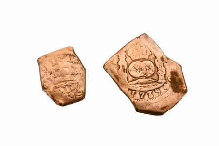 former spanish coin isolated on white background former means of payment