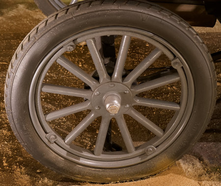 an antique car wheel from the first half of the 20th century