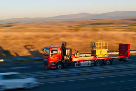 truck in motion with blurred background in the morning