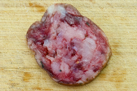 slices of Spanish sausage cured in salt