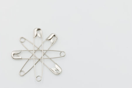 metal pins arranged in a circular patternの写真素材