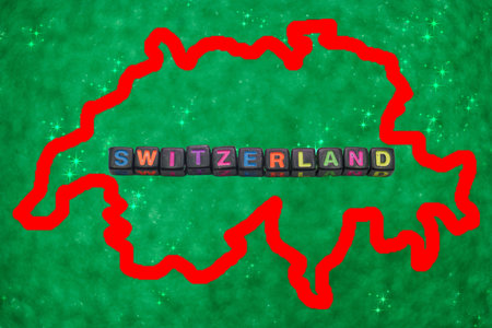 A creative depiction of Switzerland highlights the shape of the country surrounded by colorful letters spelling out Switzerland.の写真素材