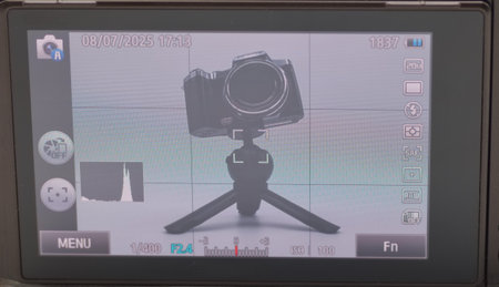 Camera display shows settings and composition focus, with the camera mounted on a stable tripod. The setup is ideal for capturing high quality images in precision.の写真素材