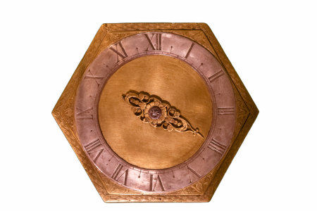 This hexagonal clock features a vintage design with ornate details and Roman numerals. Its golden...