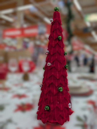 Decorative Christmas arrangement with festive elements under a bright full moonの写真素材