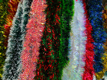 Decorative Christmas arrangement with festive elements under a bright full moonの写真素材