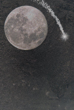 Decorative Christmas arrangement with festive elements under a bright full moonの写真素材