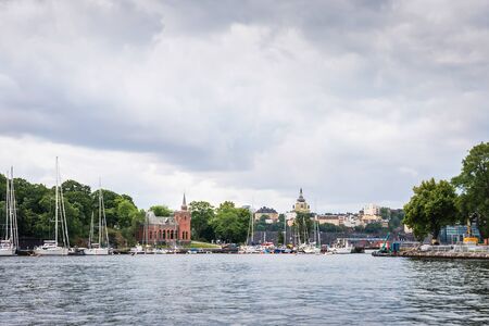 View over Södermalm district in Stockholm, Sweden, seen from water, Baltic seaの写真素材