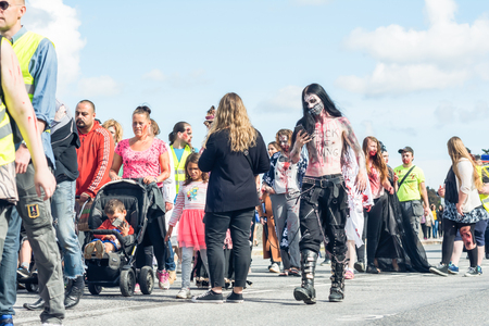 STOCKHOLM, SWEDEN â AUGUST 20, 2016: People dressed up as zombies participate in annual Zombie Walk parade in Stockholm, Swedenのeditorial素材