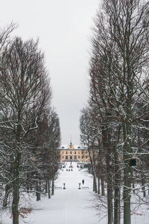 STOCKHOLM, SWEDEN - JANUARY 7, 2017: View over Drottningholm Palace and park on a winter day. Home residence of Swedish royal family. Famous landmark and tourist destination in Stockholm, Swedenのeditorial素材