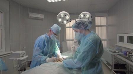 hands surgeon using an electronic scalpel close upの写真素材