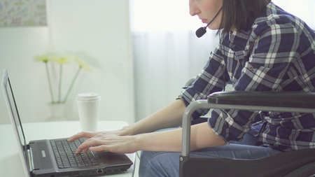 concept remote work on the Internet, wheelchair, disabled personの写真素材