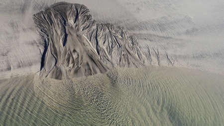 Sandy structure on the beach after the tide.の写真素材
