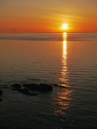 Sunrise over the sea on Norwegian Lofoten Islandsの写真素材