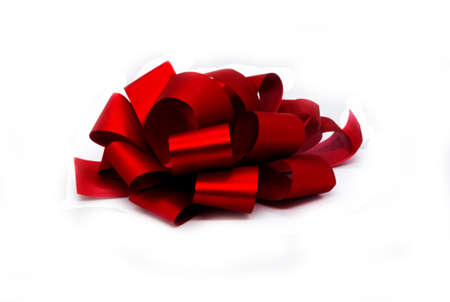 Red bow from a gift on a white background.