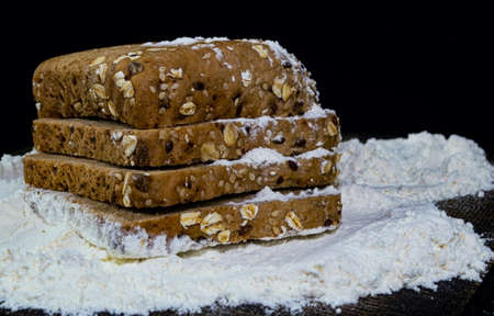 Wholegrain bread sprinkled with flour.の写真素材